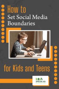 A young boy with glasses focused on using a laptop at a desk, with a mug and smartphone nearby, using the social media boundaries for kids his parents established from the tips in this blog post by https://stagingsite.specialedresource.com/